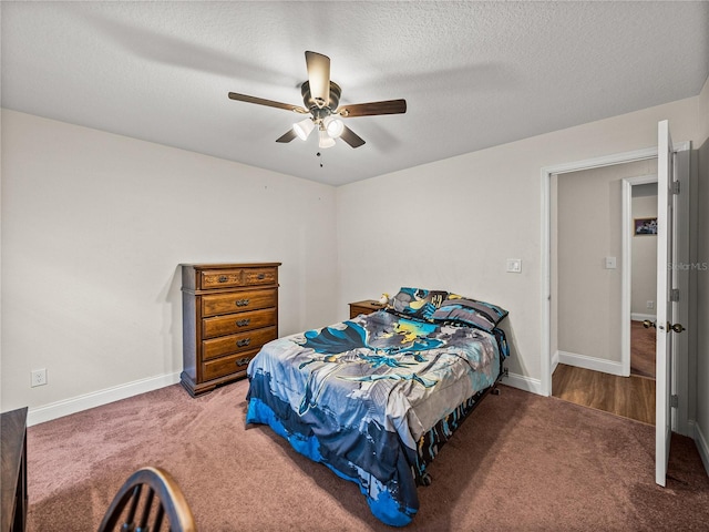 609 W Pipkin Rd, Lakeland, FL 33813 - bedroom featuring carpet flooring, a ceiling fan, and a textured ceiling