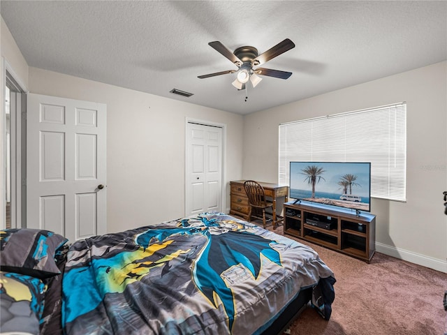 609 W Pipkin Rd, Lakeland, FL 33813 - carpeted bedroom with a ceiling fan and a closet