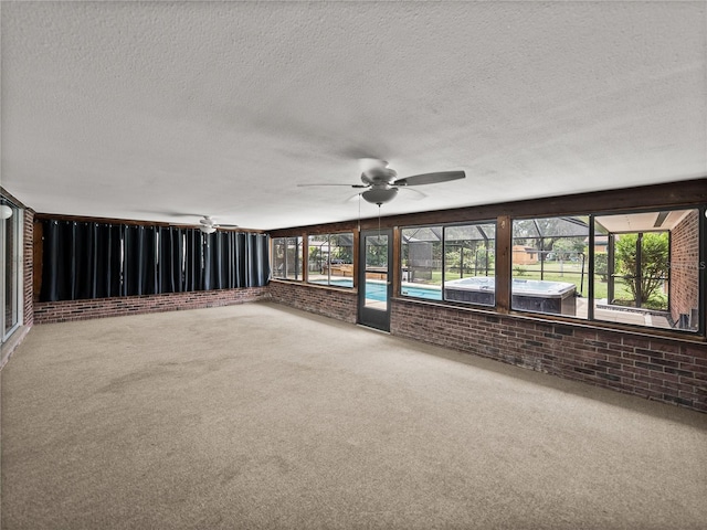 609 W Pipkin Rd, Lakeland, FL 33813 - unfurnished sunroom featuring a ceiling fan