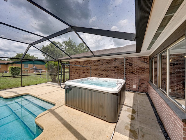 609 W Pipkin Rd, Lakeland, FL 33813 - swimming pool featuring a hot tub, a patio, and a lanai