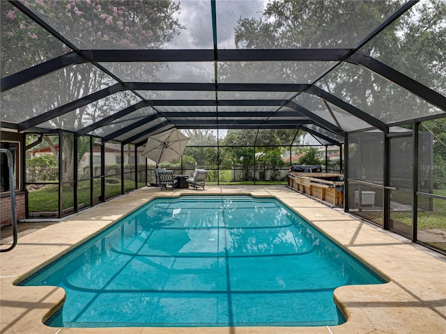 609 W Pipkin Rd, Lakeland, FL 33813 - outdoor pool featuring a patio area and a lanai