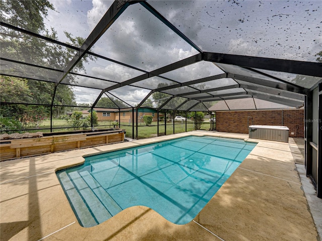 609 W Pipkin Rd, Lakeland, FL 33813 - swimming pool with a patio area and a lanai