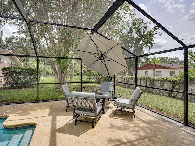 609 W Pipkin Rd, Lakeland, FL 33813 - fenced backyard featuring a patio area, a lanai, and outdoor lounge area