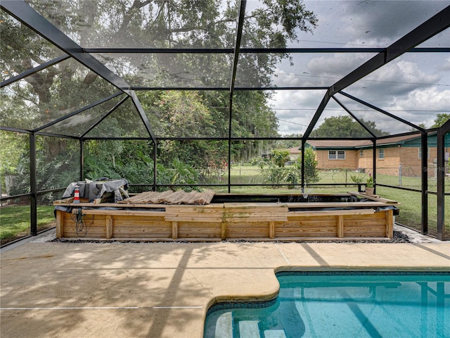 609 W Pipkin Rd, Lakeland, FL 33813 - outdoor pool with a patio area and glass enclosure