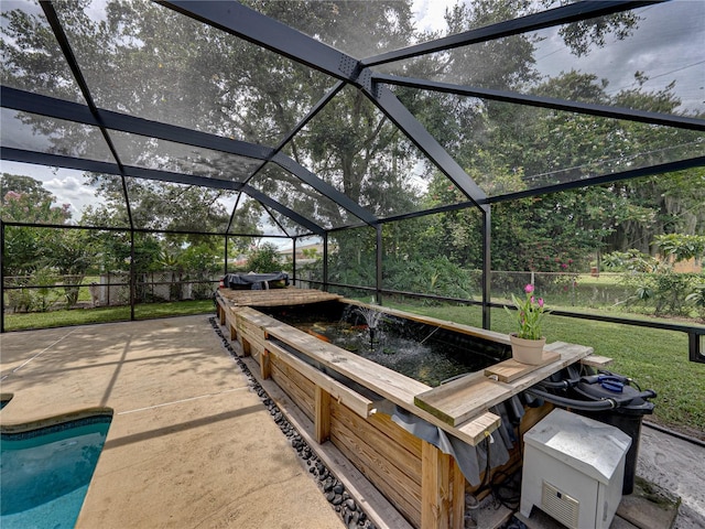 609 W Pipkin Rd, Lakeland, FL 33813 - view of patio with glass enclosure and an outdoor pool
