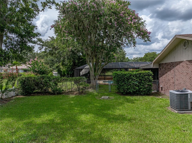 609 W Pipkin Rd, Lakeland, FL 33813 - view of yard featuring glass enclosure