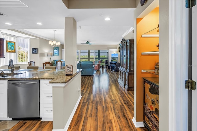 6399 Shoreline Dr Unit 4201, Saint Petersburg, FL 33708 - kitchen featuring stainless steel dishwasher, dark wood-style flooring, a ceiling fan, white cabinets, and dark stone counters