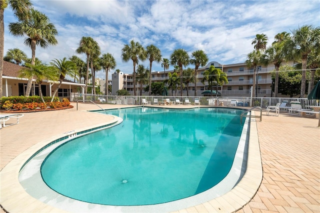 6399 Shoreline Dr Unit 4201, Saint Petersburg, FL 33708 - community pool featuring a patio