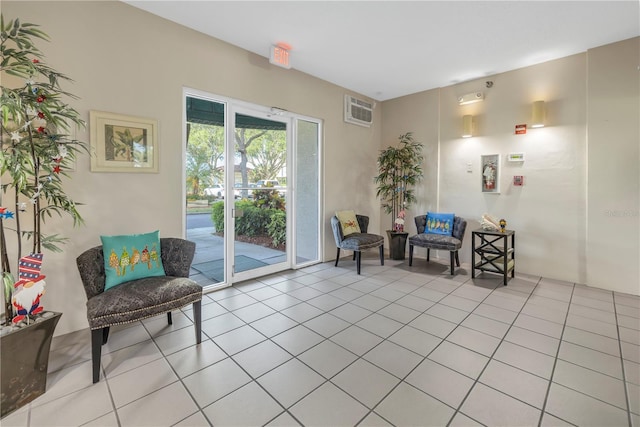 6399 Shoreline Dr Unit 4201, Saint Petersburg, FL 33708 - sitting room featuring light tile patterned floors and a wall unit AC