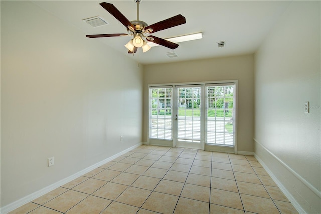 2442 Dando St, Port Charlotte, FL 33948 - unfurnished room with light tile patterned flooring and a ceiling fan