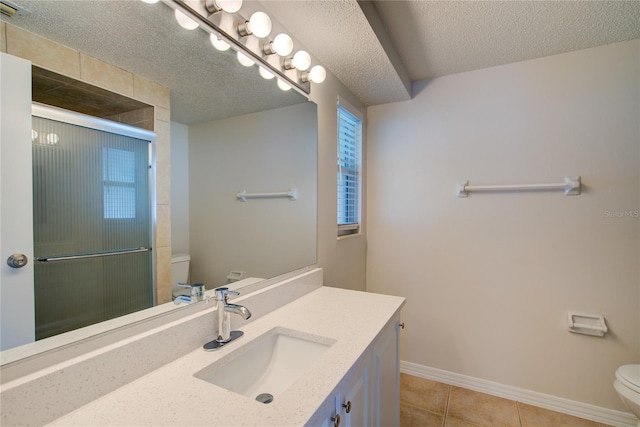 2442 Dando St, Port Charlotte, FL 33948 - full bath with vanity, a shower with door, a textured ceiling, and tile patterned flooring
