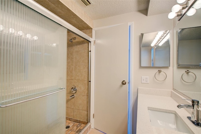 2442 Dando St, Port Charlotte, FL 33948 - full bathroom with a shower stall, a textured ceiling, and vanity