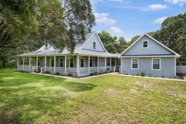 828 E Savoy St, Lecanto, FL 34461 - country-style home with covered porch and a front yard