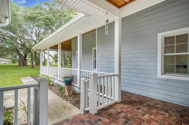 828 E Savoy St, Lecanto, FL 34461 - covered porch with a lawn