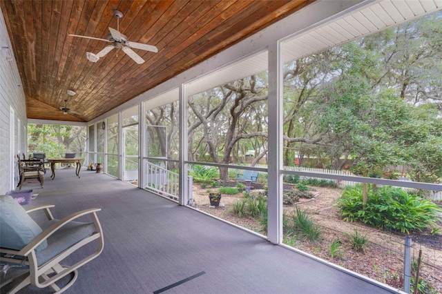 828 E Savoy St, Lecanto, FL 34461 - unfurnished sunroom featuring ceiling fan and vaulted ceiling