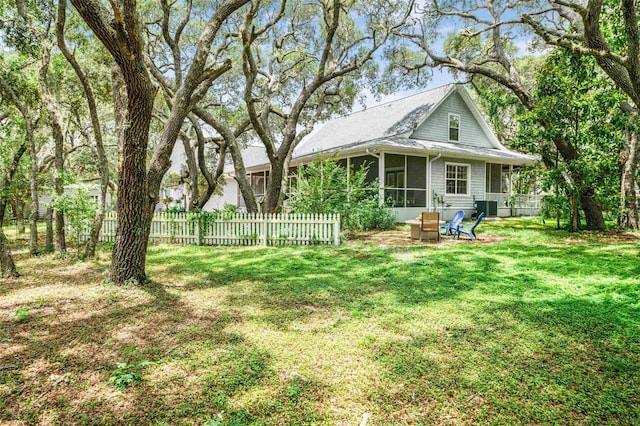 828 E Savoy St, Lecanto, FL 34461 - view of yard with a sunroom