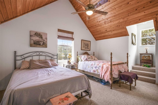 828 E Savoy St, Lecanto, FL 34461 - carpeted bedroom featuring wooden ceiling, ceiling fan, and high vaulted ceiling