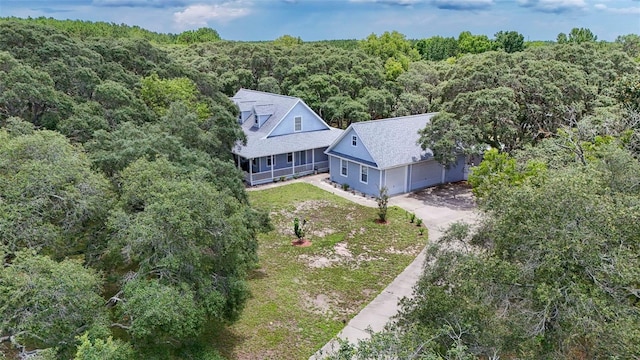 828 E Savoy St, Lecanto, FL 34461 - aerial view of property and surrounding area with a forest