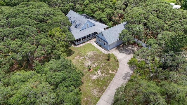 828 E Savoy St, Lecanto, FL 34461 - view of subject property featuring a heavily wooded area