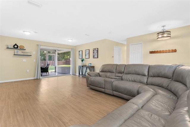 4233 Oak Ln, Saint Augustine, FL 32086 - living area featuring light wood finished floors and baseboards