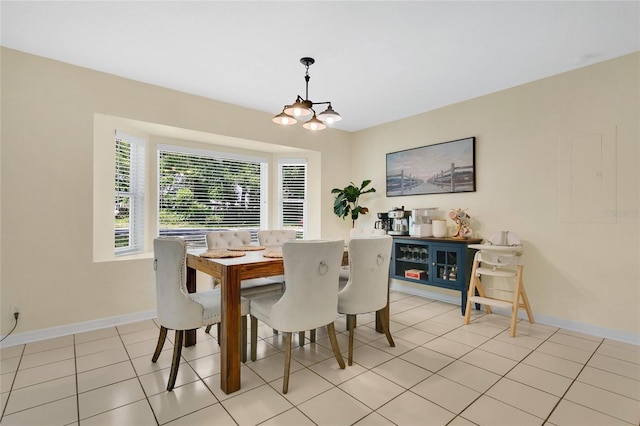 4233 Oak Ln, Saint Augustine, FL 32086 - dining room with a chandelier and light tile patterned flooring