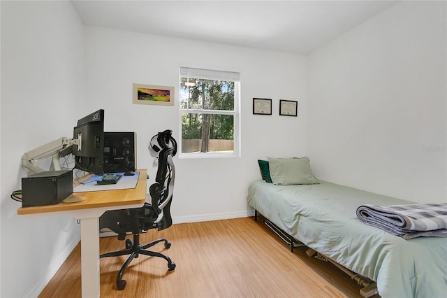 4233 Oak Ln, Saint Augustine, FL 32086 - bedroom featuring wood finished floors and a desk