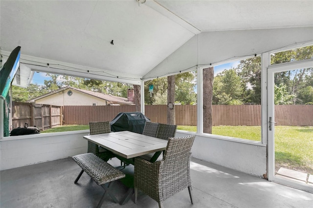 4233 Oak Ln, Saint Augustine, FL 32086 - sunroom / solarium featuring lofted ceiling, healthy amount of natural light, and outdoor dining area