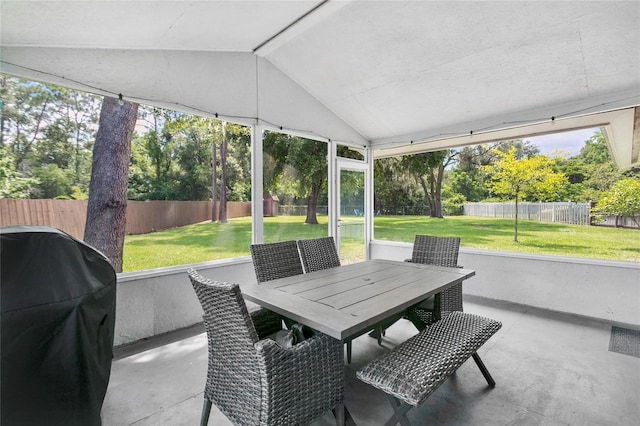 4233 Oak Ln, Saint Augustine, FL 32086 - sunroom with vaulted ceiling, healthy amount of natural light, and outdoor dining area