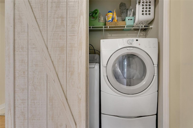 4233 Oak Ln, Saint Augustine, FL 32086 - laundry room featuring washer / dryer