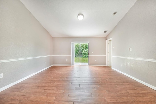 161 Oak Crossing Blvd, Auburndale, FL 33823 - spare room featuring wood finished floors and baseboards