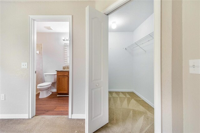161 Oak Crossing Blvd, Auburndale, FL 33823 - walk in closet featuring light colored carpet