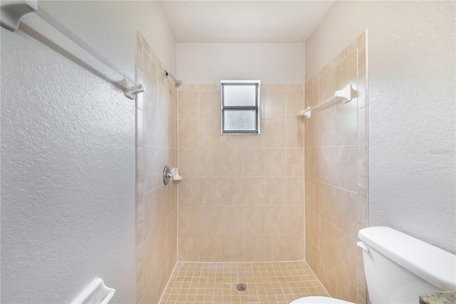 161 Oak Crossing Blvd, Auburndale, FL 33823 - full bathroom with a textured wall and tiled shower