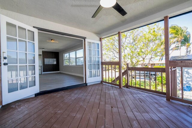 809 59th Ave, Saint Petersburg, FL 33706 - unfurnished sunroom featuring a ceiling fan