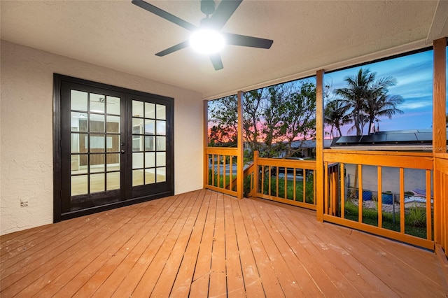 809 59th Ave, Saint Petersburg, FL 33706 - deck at dusk featuring french doors and a ceiling fan