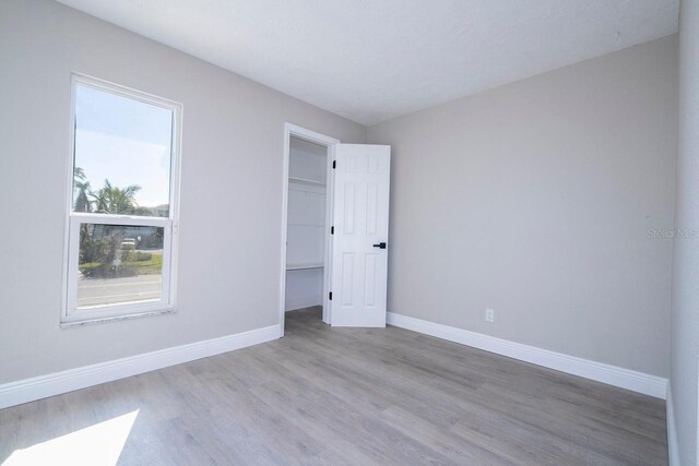 809 59th Ave, Saint Petersburg, FL 33706 - spare room with wood finished floors