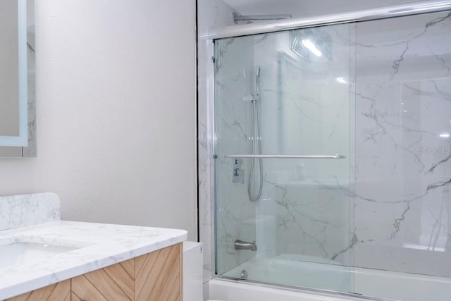 809 59th Ave, Saint Petersburg, FL 33706 - full bath with vanity and combined bath / shower with glass door
