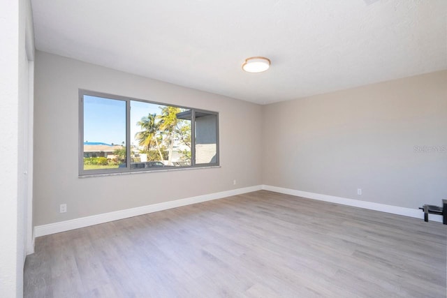 809 59th Ave, Saint Petersburg, FL 33706 - unfurnished room featuring wood finished floors