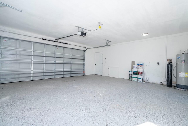 809 59th Ave, Saint Petersburg, FL 33706 - garage with water heater and a garage door opener