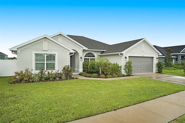 11539 Sunder Berry St, Hudson, FL 34667 - ranch-style house featuring an attached garage, concrete driveway, stucco siding, and a shingled roof