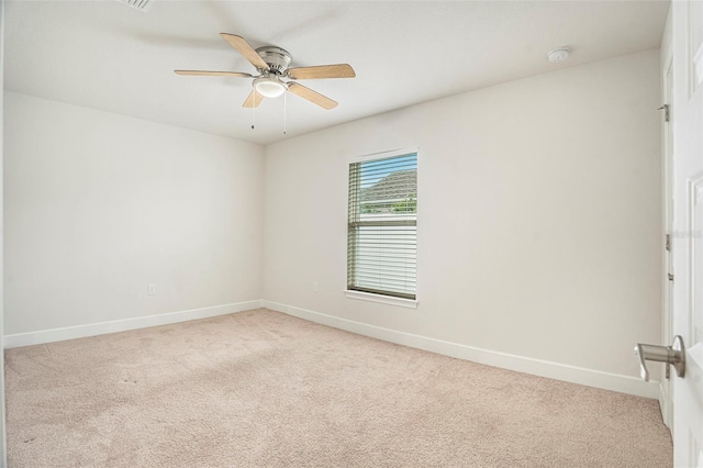 11539 Sunder Berry St, Hudson, FL 34667 - empty room with a smoke detector, light colored carpet, and ceiling fan