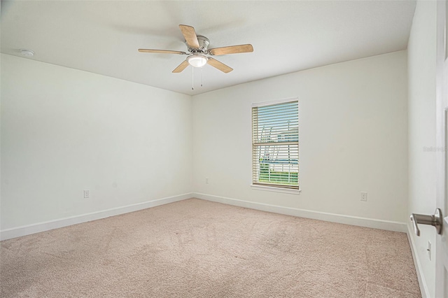 11539 Sunder Berry St, Hudson, FL 34667 - unfurnished room featuring light carpet, ceiling fan, and a smoke detector