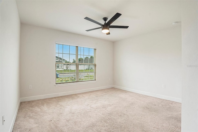 11539 Sunder Berry St, Hudson, FL 34667 - carpeted empty room with a ceiling fan and a smoke detector