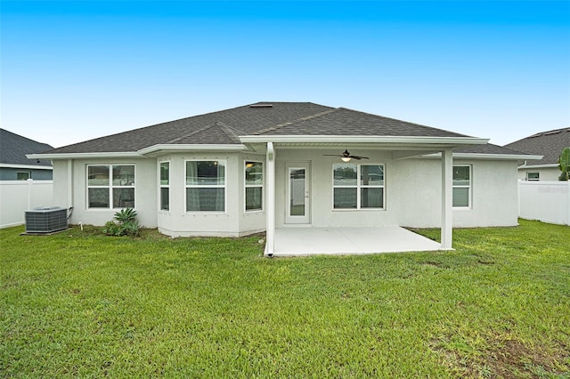 11539 Sunder Berry St, Hudson, FL 34667 - back of house with stucco siding, a patio, ceiling fan, and roof with shingles