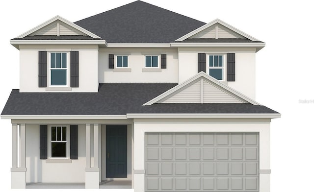 6244 29th St N, Saint Petersburg, FL 33702 - view of front of property featuring a garage, driveway, and stucco siding