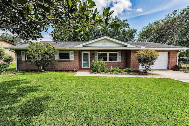 607 Spring Blossom Ct, Brandon, FL 33511 - single story home featuring a garage, concrete driveway, a front lawn, and brick siding