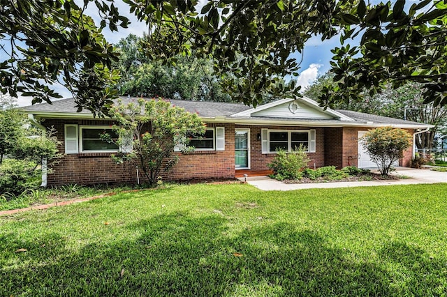 607 Spring Blossom Ct, Brandon, FL 33511 - ranch-style house with a front lawn, a garage, brick siding, and concrete driveway