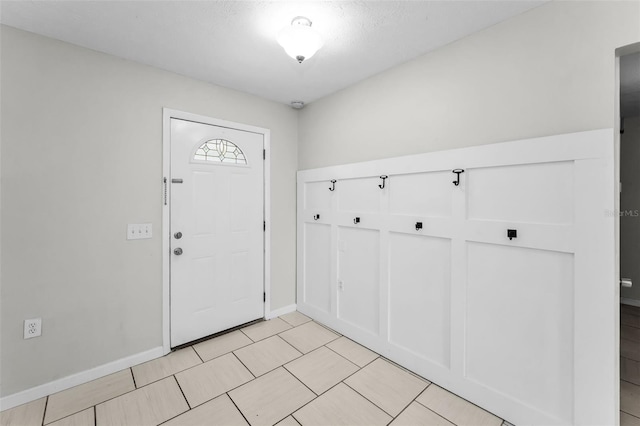 607 Spring Blossom Ct, Brandon, FL 33511 - foyer entrance with baseboards and light tile patterned flooring