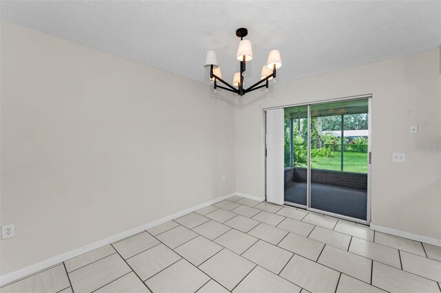 607 Spring Blossom Ct, Brandon, FL 33511 - empty room featuring a chandelier and light tile patterned flooring