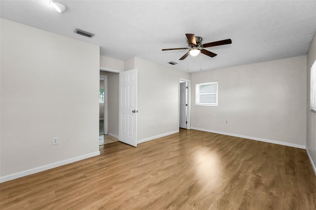 607 Spring Blossom Ct, Brandon, FL 33511 - unfurnished room featuring ceiling fan and light wood-style floors