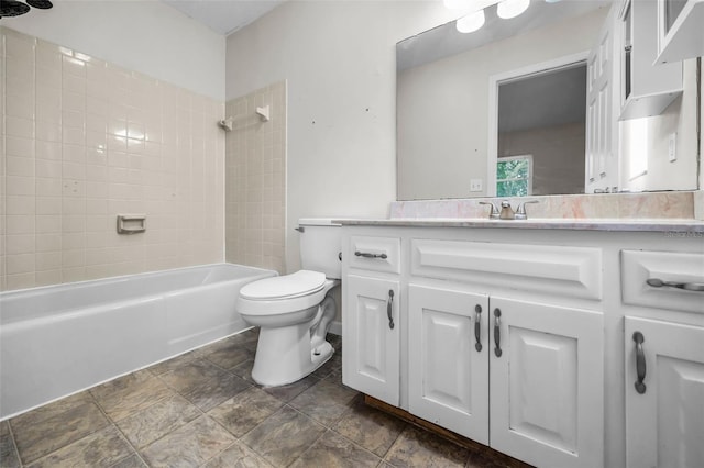 607 Spring Blossom Ct, Brandon, FL 33511 - bathroom with vanity, washtub / shower combination, and stone finish floors